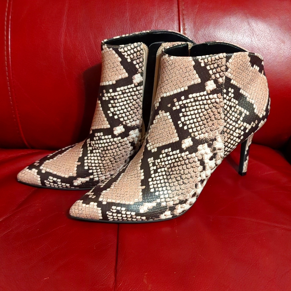 Nine West snake print booties. size 7. black, white, and taupe.